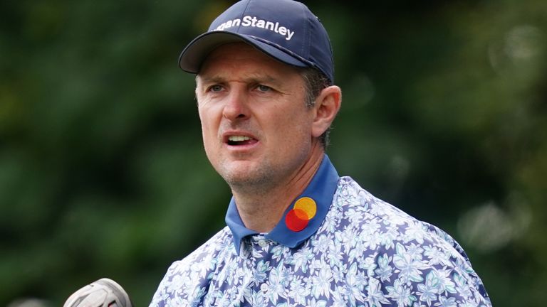 Justin Rose held a share of the halfway lead on home soil