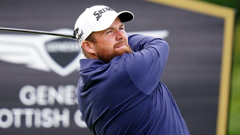 Shane Lowry tees off on the fourth hole on his way to shooting 65 to fire himself right into contention