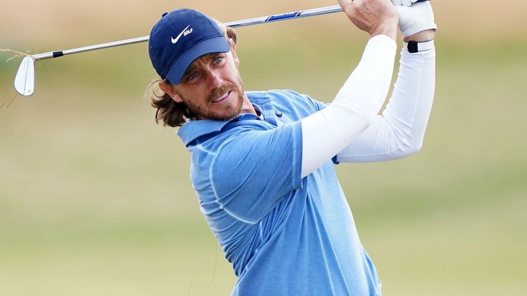 Tommy Fleetwood plays his second shot on the 16th during his spectacular third round