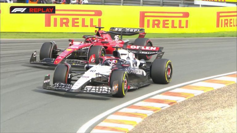 Making his debut for Alpha Tauri, Liam Lawson battles with Ferrari's Charles Leclerc at the Dutch GP