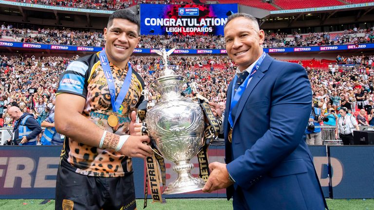 John Asiata and Adrian Lam celebrate with the Challenge Cup in front of Leigh's fans