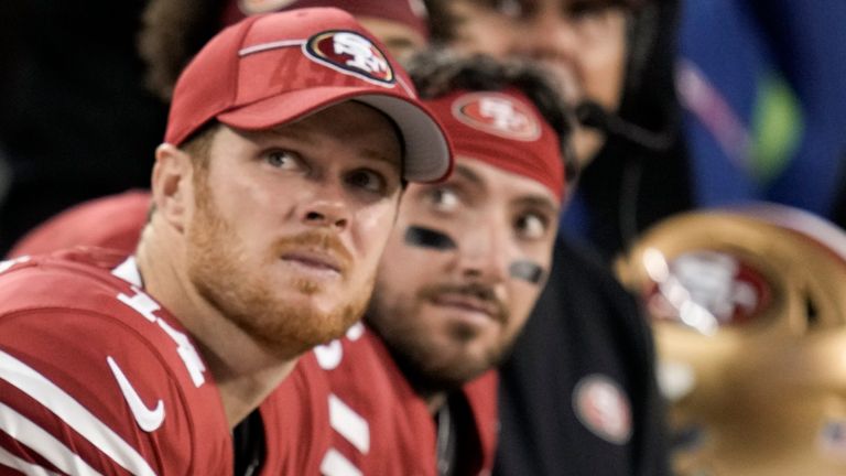 Sam Darnold (left) will be back-up quarterback to Brock Purdy for 49ers this season