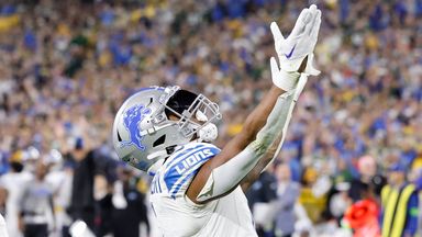 Detroit Lions running back David Montgomery celebrates one of his three touchdowns 