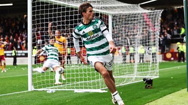 Matt O'Riley celebrates after scoring Celtic's stoppage-time winner