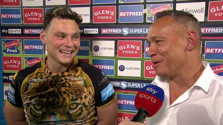 Adrian Lam teases his son Lachlan about having been included in three Super League Dream Team's against his one.