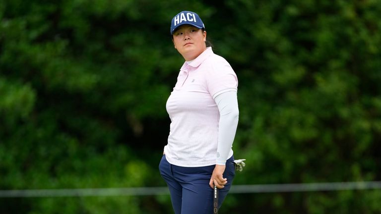 Angel Yin pauses on the first green during the first round of the Women's PGA Championship