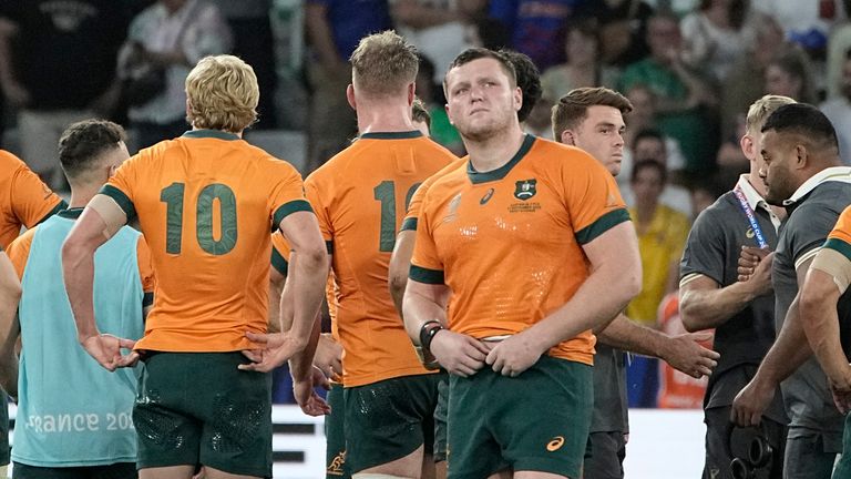 Australia's players were left dejected after their loss to Fiji