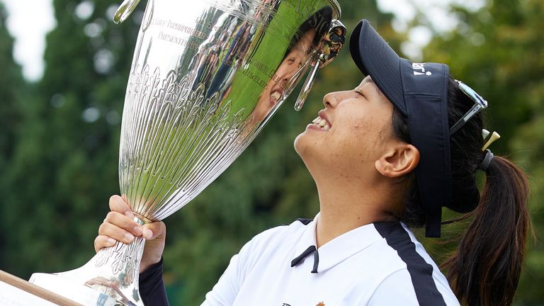 Chanettee Wannasaen holds the trophy after winning the LPGA Portland Classic