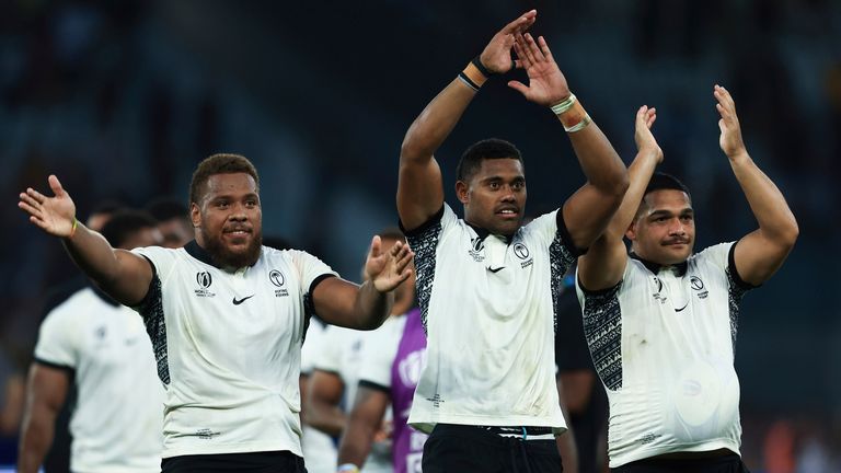 Fiji's players celebrate after the win over Australia