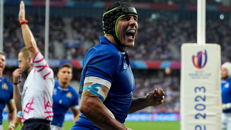 Italy's Juan Ignacio Brex celebrates after scoring a try during the Rugby World Cup Pool A match between Italy and Uruguay at the Stade de Nice (AP Photo/Pavel Golovkin)