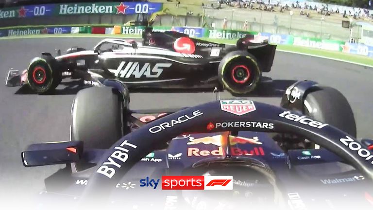 Sergio Perez tries to pass Kevin Magnussen but locks up and sends him spinning at Suzuka