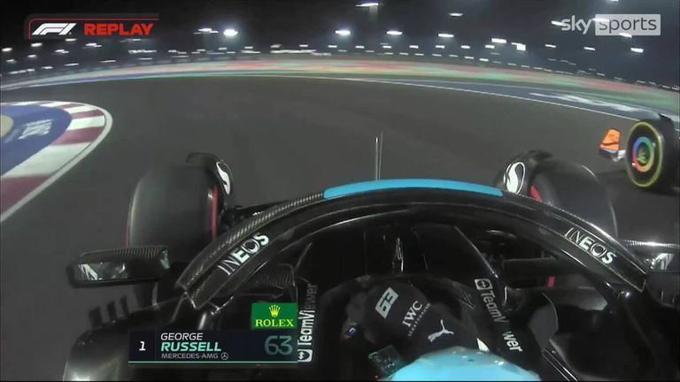George Russell dives down the inside to take the lead from Oscar Piastri in the Qatar Grand Prix Sprint