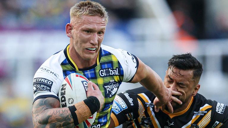 Leeds Rhinos earned the top mark in a new Super League grading process, while Castleford Tigers are to appeal their score