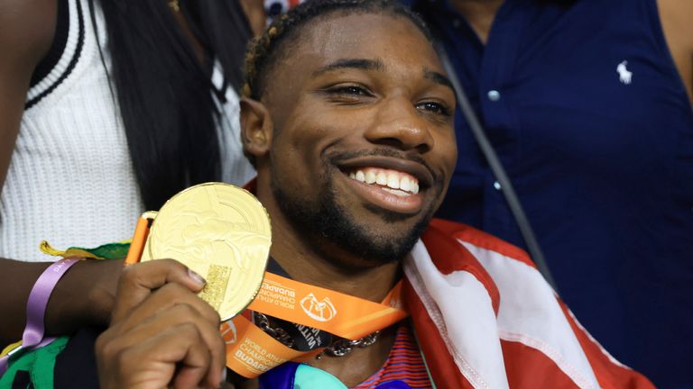 Lyles celebrates after winning the 200m of the World Athletics Championships in Budapest