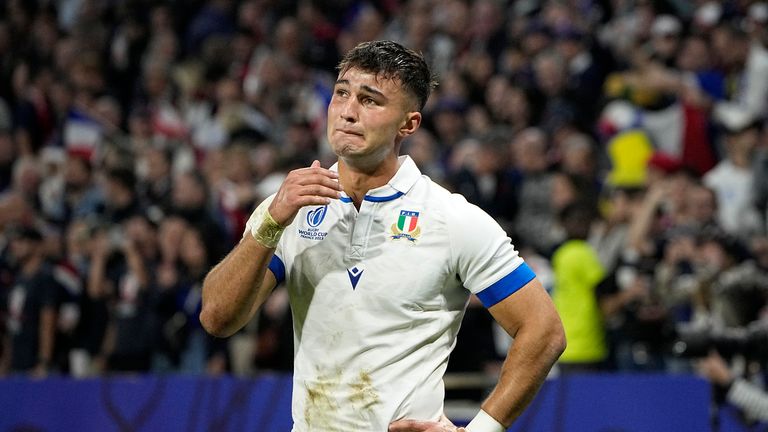 Italy's Lorenzo Pani reacts after crashing out of the Rugby World Cup after defeat to France