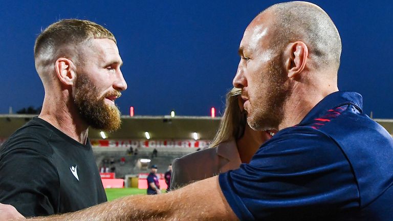 Retiring rivals Sam Tomkins and James Roby embrace ahead of Catalans' semi-final against St Helens