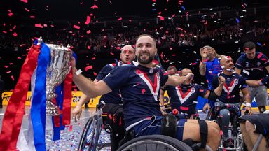 France's Florian Guttadoro lifts the trophy after their victory over England