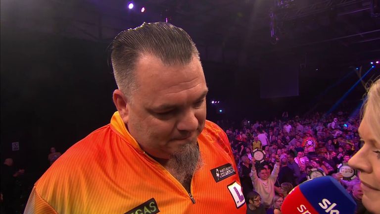 After wins over Peter Wright and Stephen Bunting, Stowe Buntz has qualified from the group stages of the Grand Slam of Darts