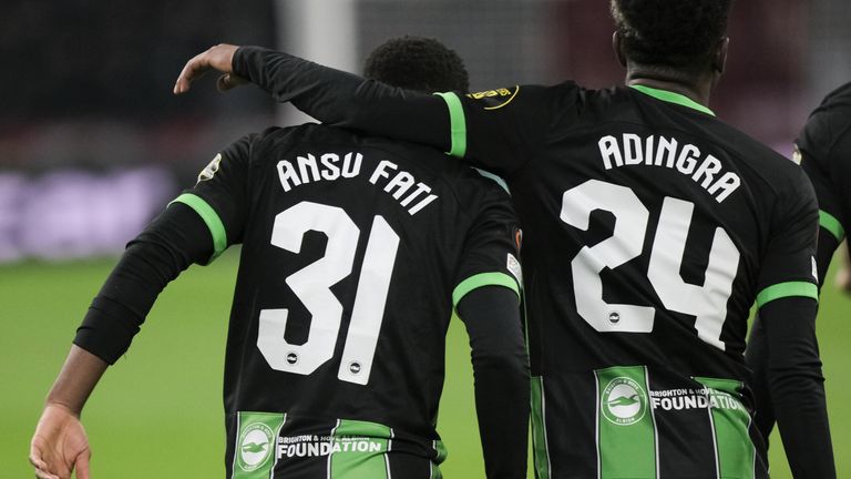 Brighton's Simon Adingra celebrates with Brighton's Ansu Fati