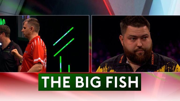 Krzysztof Ratajski sticks 'The Big Fish' in the net against Michael Smith during the Grand Slam of Darts