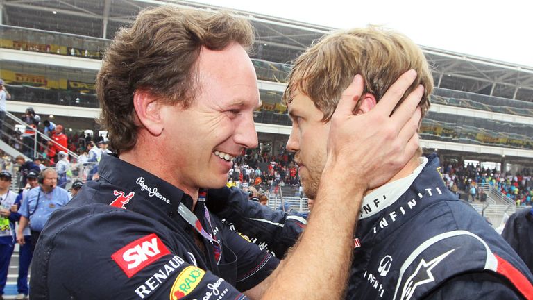 Sebastian Vettel and Christian Horner celebrate their third world championship