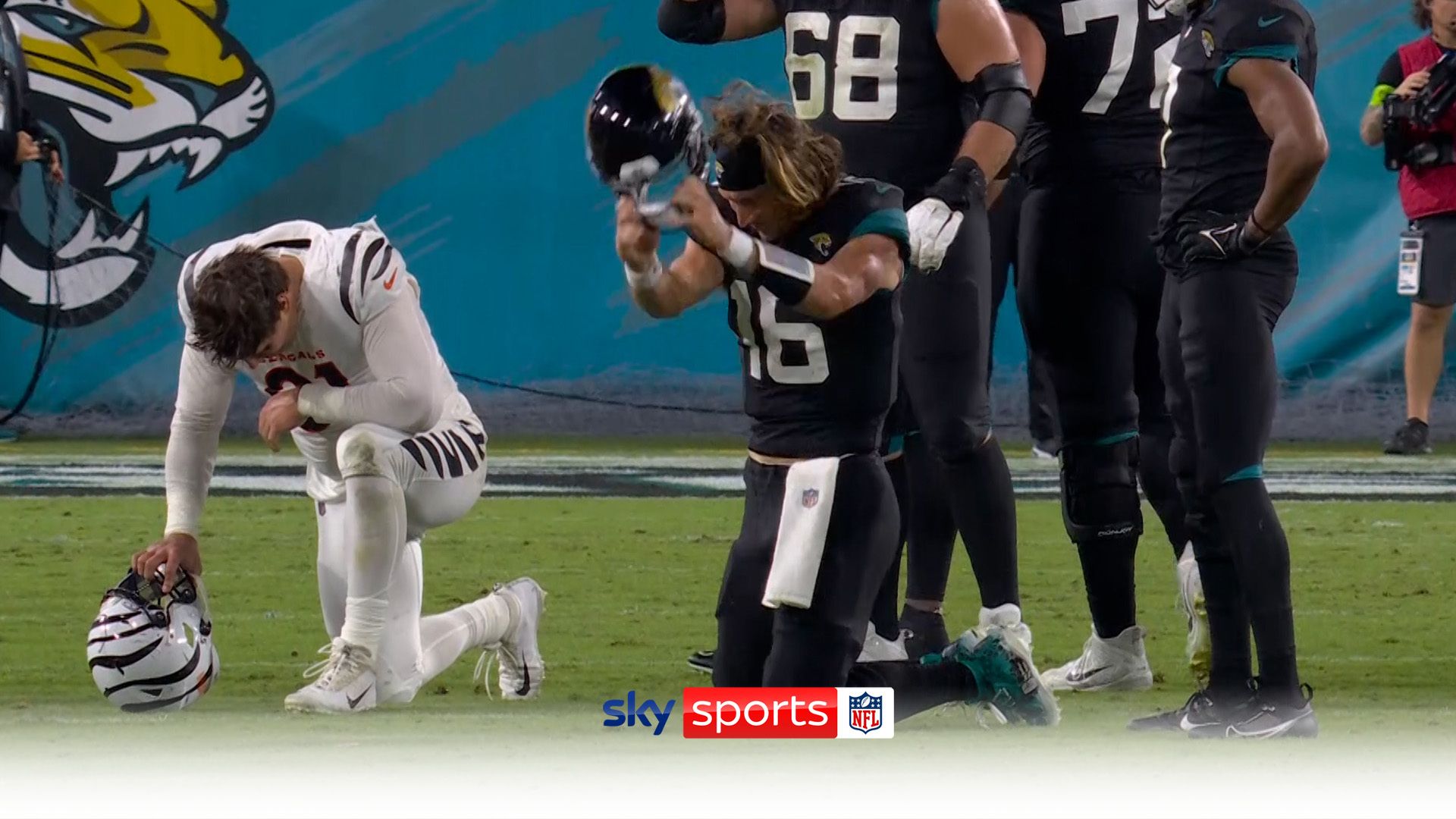 Lawrence throws helmet in frustration at injury
