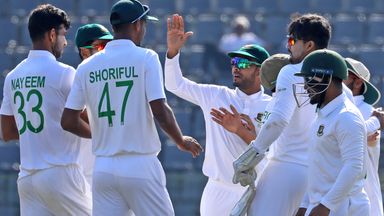 Bangladeshi cricketers celebrate after Daryl Mitchell was dismissed