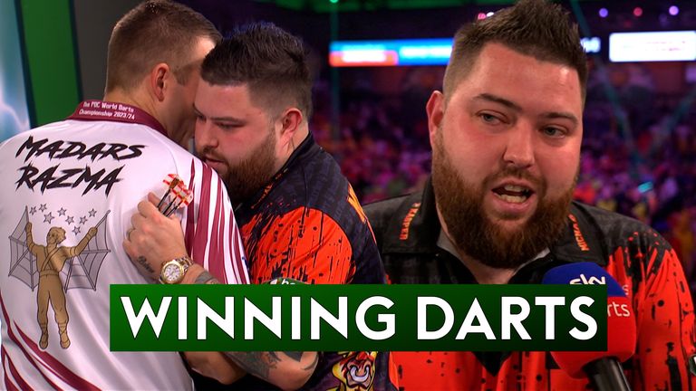 Michael Smith is into the last 16 after a tough third-round match against Madars Razma at the World Darts Championship.  