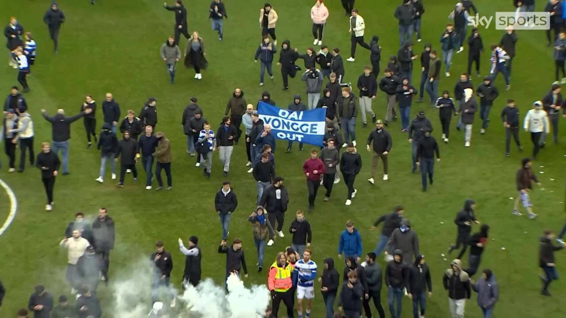 Reading game abandoned after fans invade pitch to protest against owner