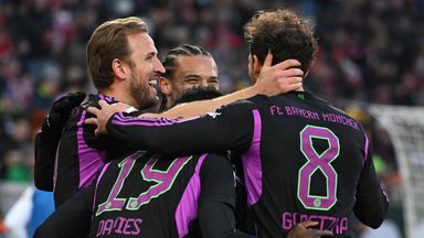 Harry Kane celebrates as Bayern beat Augsburg