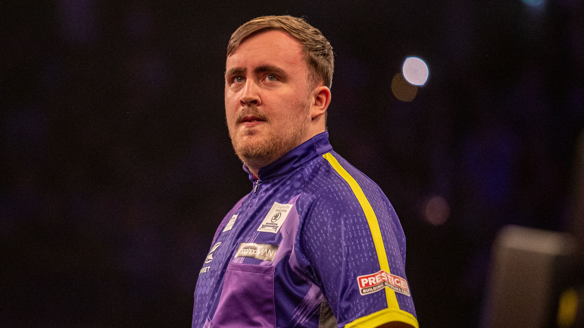 Littler fires nine-darter and wins on Players Championship debut