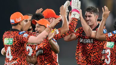 Sunrisers Hyderabad's captain Pat Cummins, right without cap, celebrates with teammates after the dismissal of Mumbai Indians' Rohit Sharma during the Indian Premier League cricket tournament between Sunrisers Hyderabad and Mumbai Indians in Hyderaba