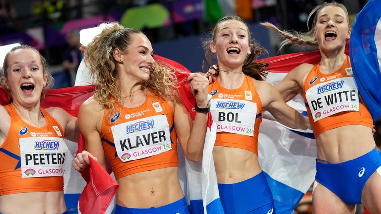 Team Netherlands celebrates after winning the gold medal in the women's 4x400m relay 