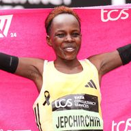 Peres Jepchirchir celebrates winning the women's elite race and breaking the women's record during the TCS London Marathon