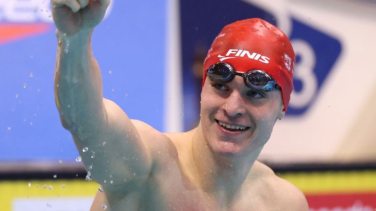 Oliver Morgan broke the British 100m backstroke record to retain his title and qualify for the 2024 Paris Olympics