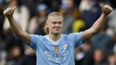 Erling Haaland gestures to Manchester City supporters at full-time