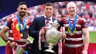 Wigan head coach Matt Peet, captain Liam Farrell and Lance Todd Trophy winner Bevan French celebrate their Challenge Cup success