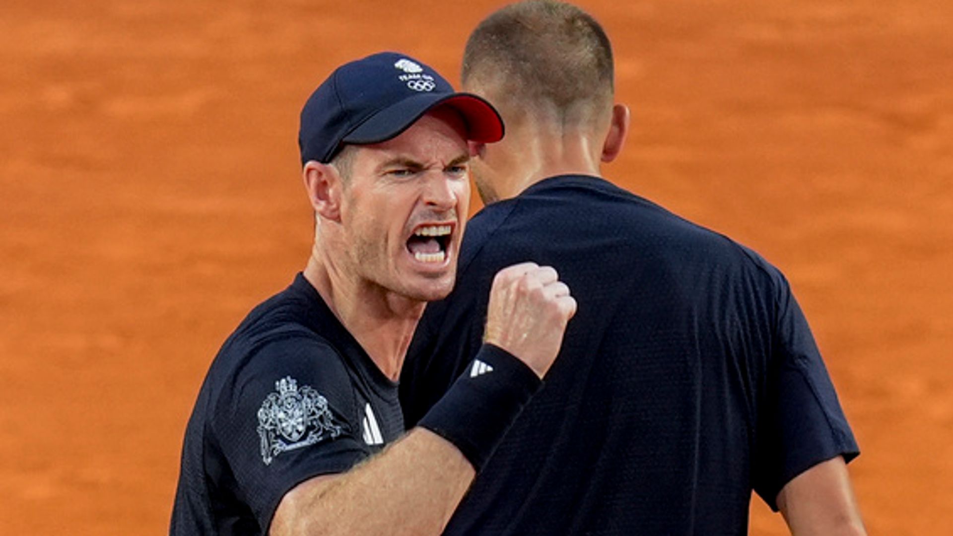 Murray and Evans into Olympics quarter-finals after dramatic victory