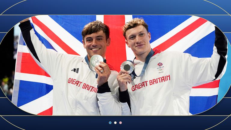 Britain's Tom Daley and Noah Williams celebrate on the podium after winning the silver in the men's synchro 10m platform diving final