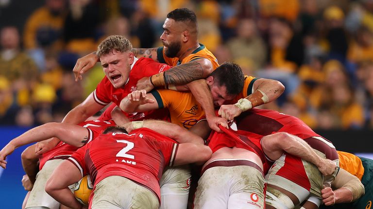 Wales, despite going down to 14 players after Australia's opening try, responded with a strong driving maul to force a penalty try 