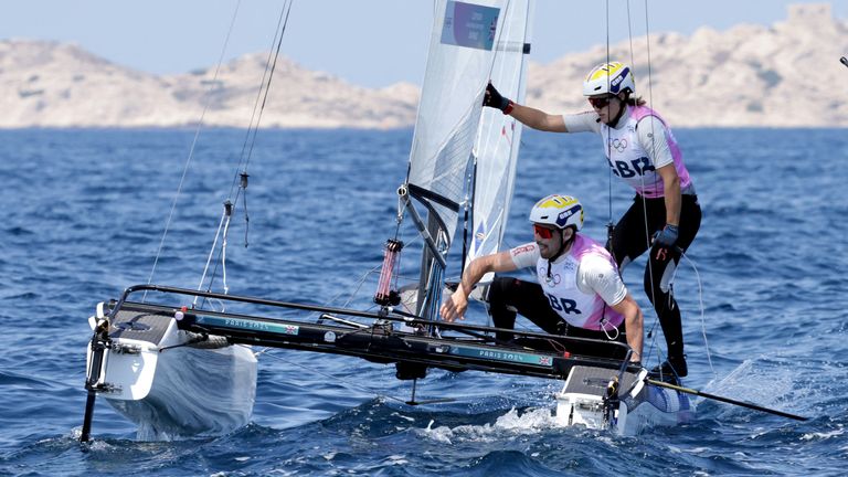 John Gimson and Anna Burnet's medal hopes were ended by disqualification in the medal race of the mixed multihull
