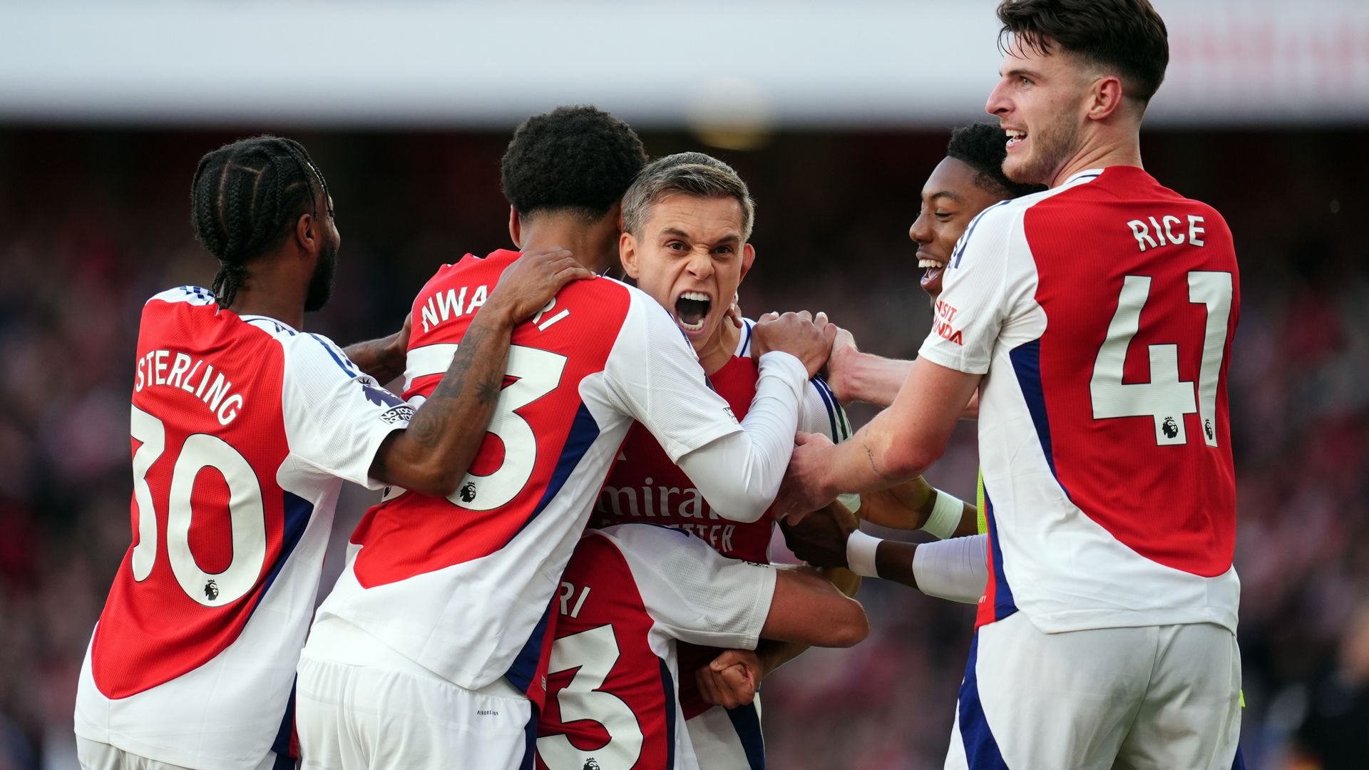 Arsenal score twice late on to beat Leicester in 'emotional' win