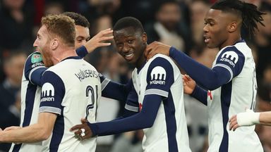 Pape Sarr celebrates with his team-mates after putting Spurs 2-0 up 