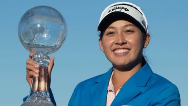 Jeeno Thitikul poses with the CME Group Tour Championship trophy after her valuable success