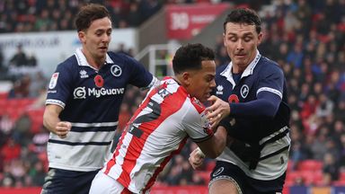 Stoke City's Million Manhoef runs past Dan McNamara of Millwall