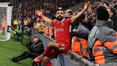 Liverpool's Mohamed Salah celebrates after scoring their second goal against Aston Villa