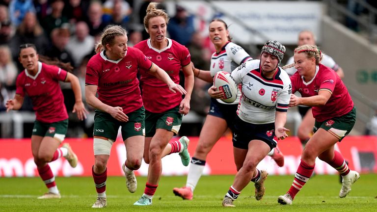 England's Katie Mottershead breaks away to score a try against Wales