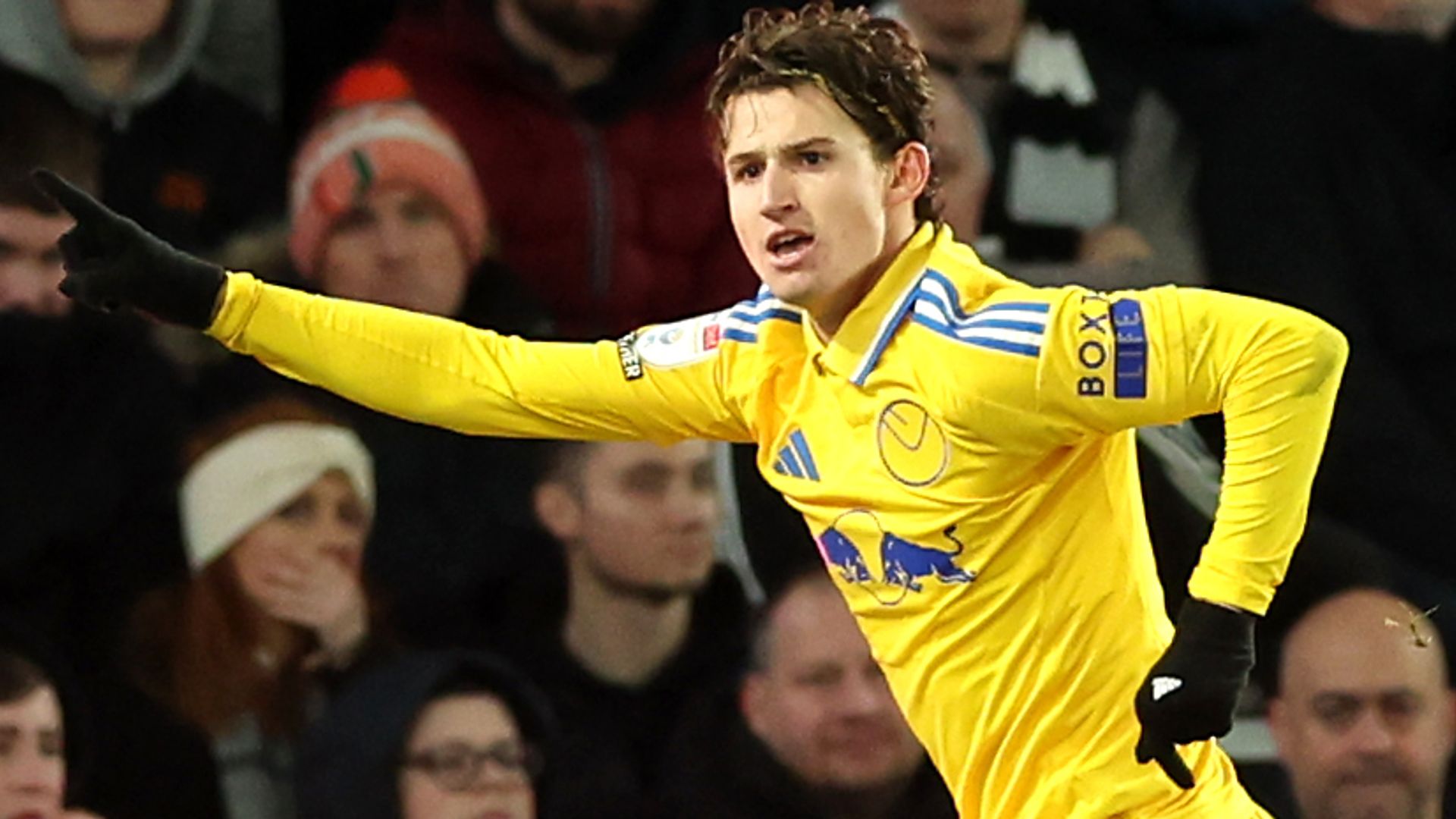 Leeds unlock stubborn Derby with 'goal of the season' to go top