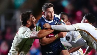 Leicester Tigers star Freddie Steward (centre) is tackled by Sharks pair Bradley Davids and Francois Venter