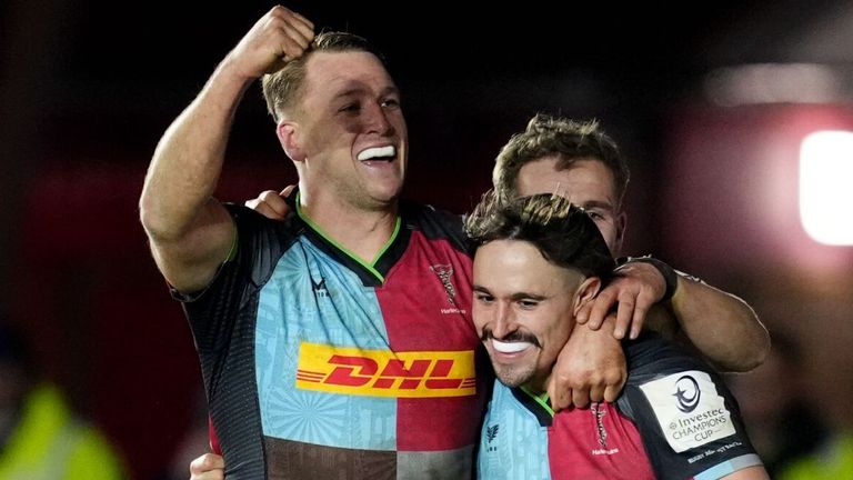 Harlequins' Cadan Murley (right) is embraced by team-mates after scoring his side's sixth try